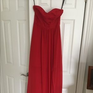 Stunning long red strapless Aryn K dress.